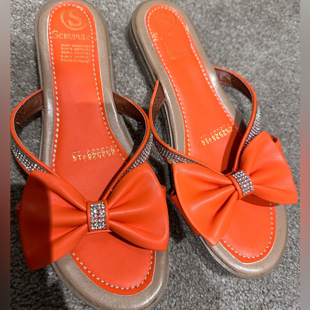 Orange sandals from Mexico.
